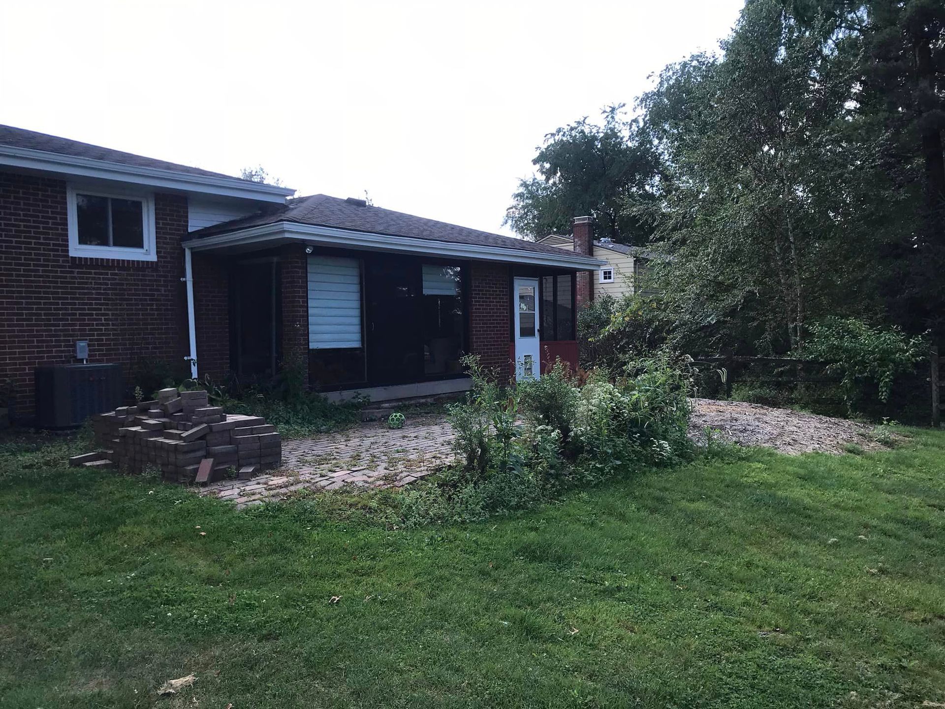 313977829_1996781080525142_1994726563110664529_n-1920w A house with a lot of grass in front of it