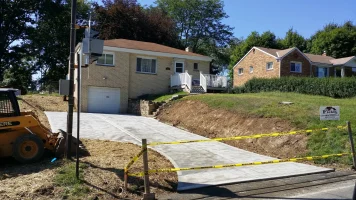 A house that is being built on the side of a hill.