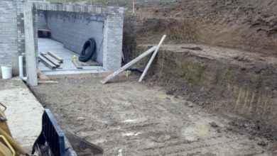 A construction site with a hole in the ground