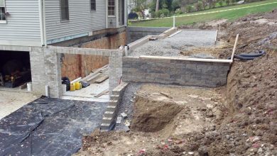 A house with a concrete slab and steps