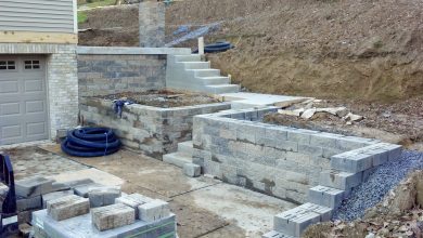 A building project with steps and walls in the process of being built.