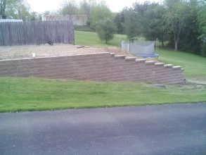 A view of some steps in the grass.